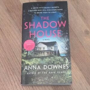 The Shadow House by Anna Downes - Black and Blue Cover